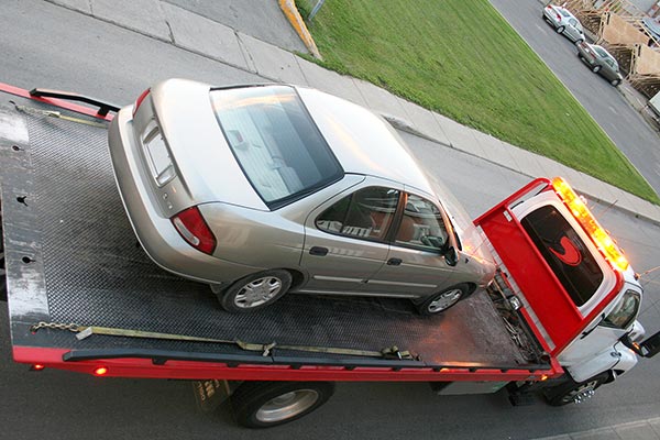 Auto Shipping 101: Flatbed Auto Transporters